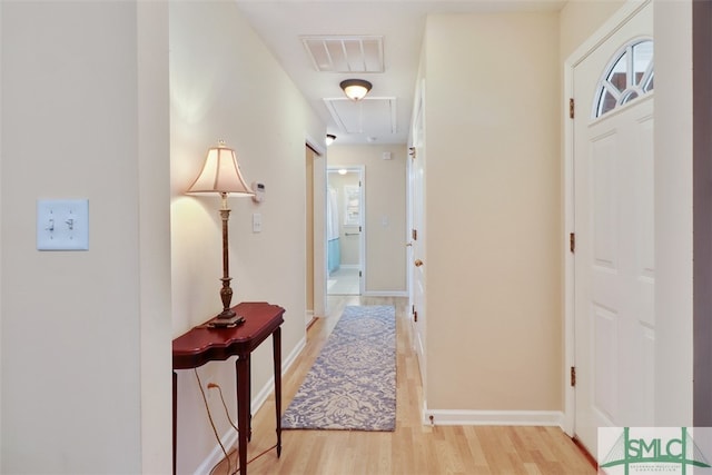 hallway featuring light hardwood / wood-style floors