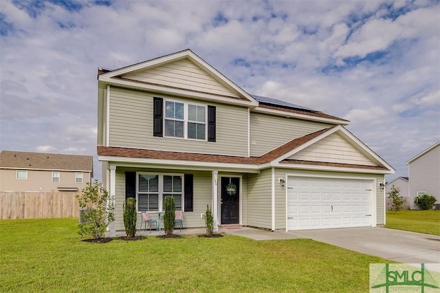 view of front of house featuring a front yard, fence, driveway, a porch, and roof mounted solar panels