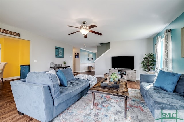 living room with hardwood / wood-style floors and ceiling fan