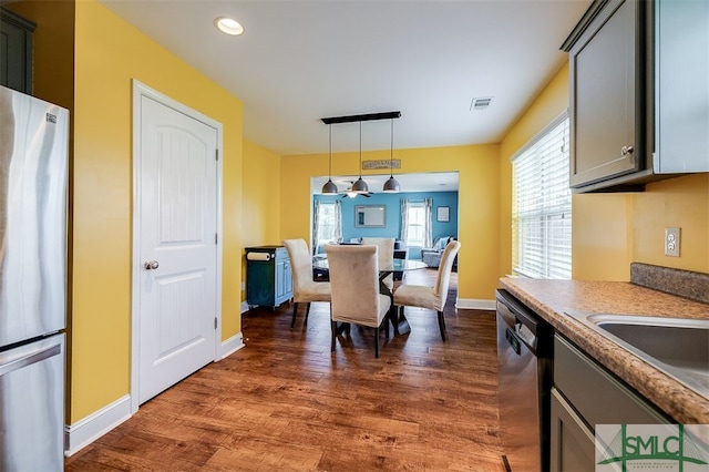 dining room featuring dark hardwood / wood-style flooring