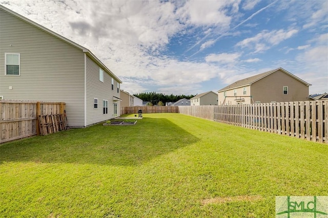 view of yard featuring a fenced backyard