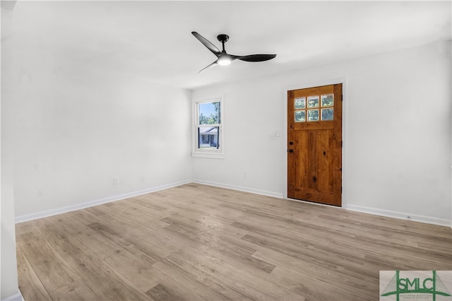 foyer entrance featuring light hardwood / wood-style flooring and ceiling fan