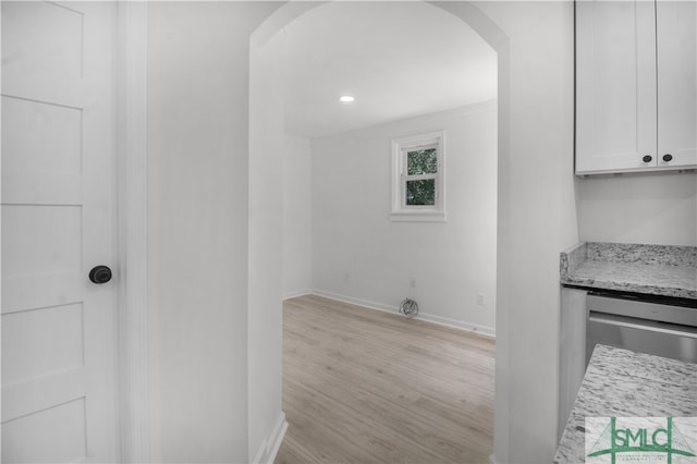 bathroom with hardwood / wood-style flooring