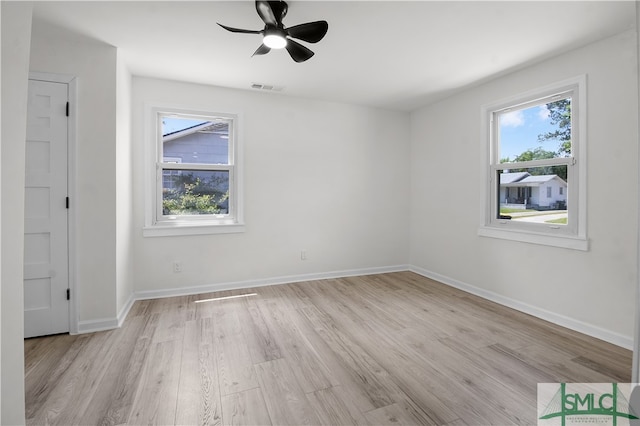 unfurnished room featuring light hardwood / wood-style flooring and ceiling fan