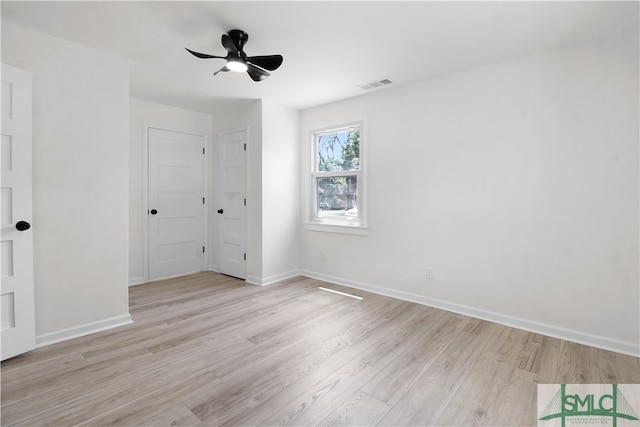 unfurnished bedroom featuring ceiling fan and light hardwood / wood-style flooring