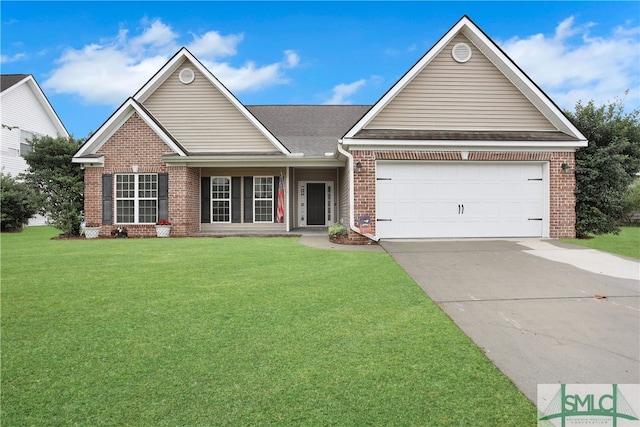 view of front facade with a garage and a front yard