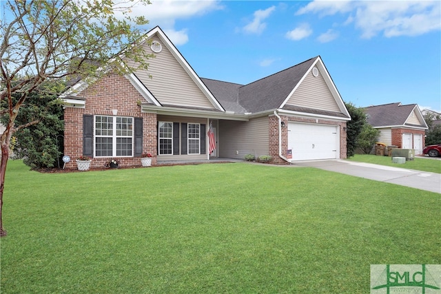 view of front of property with a garage and a front yard