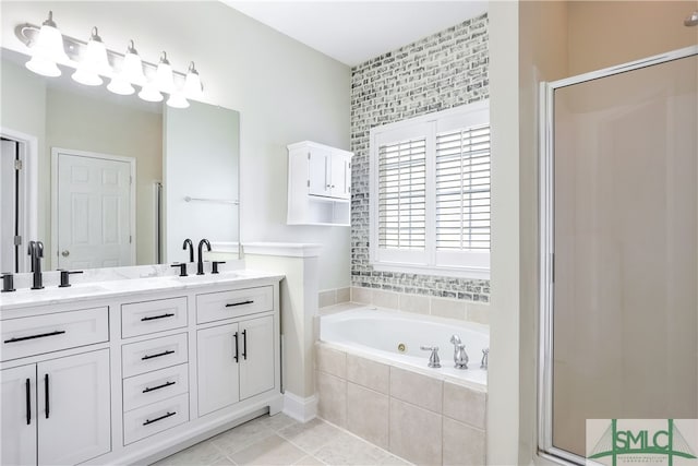 bathroom featuring tile patterned floors, vanity, and independent shower and bath