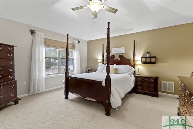 bedroom with ceiling fan and light colored carpet