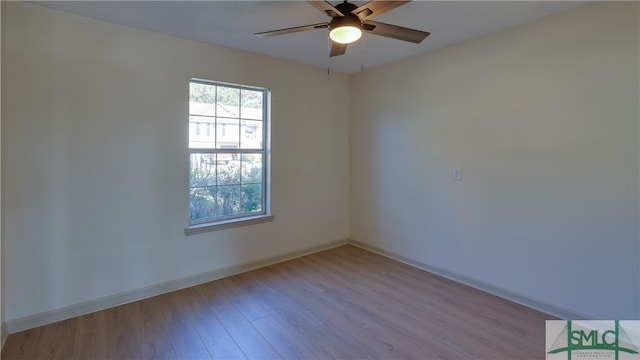 empty room featuring light hardwood / wood-style floors and ceiling fan