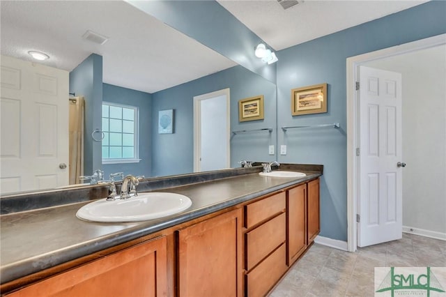 bathroom featuring vanity