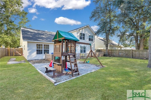 view of play area featuring a lawn