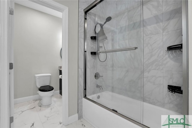 bathroom featuring toilet and enclosed tub / shower combo