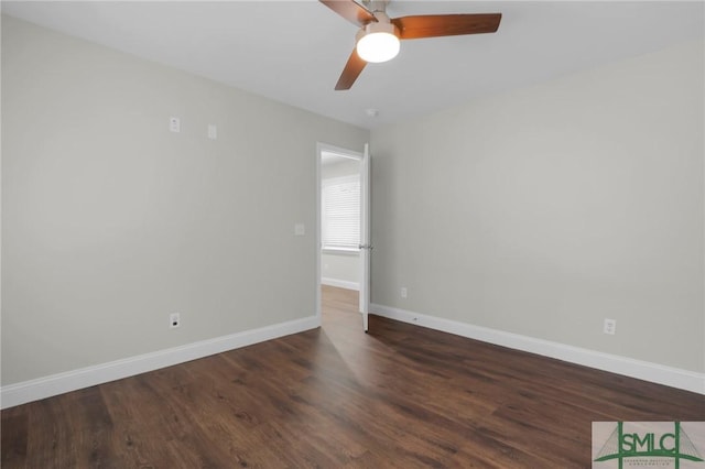 unfurnished room featuring ceiling fan and dark wood-type flooring