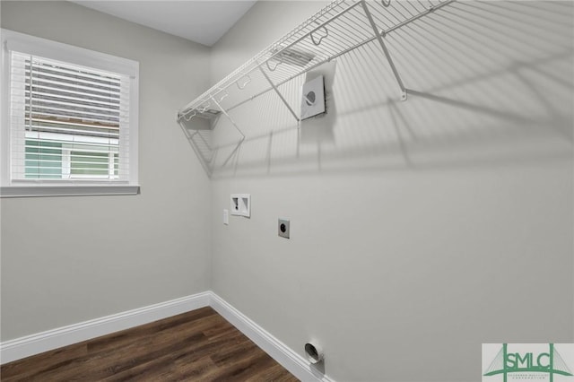 laundry room with washer hookup, dark hardwood / wood-style flooring, and electric dryer hookup