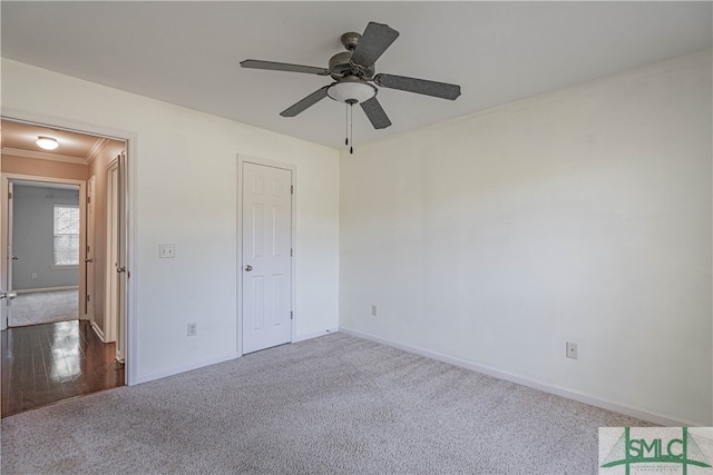 unfurnished bedroom with ceiling fan, wood-type flooring, and ornamental molding