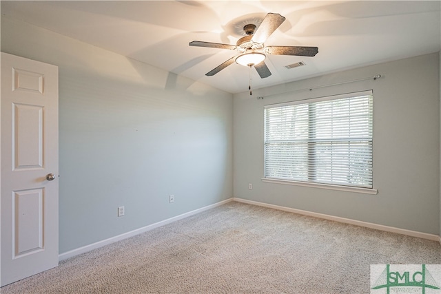 unfurnished room featuring carpet and ceiling fan