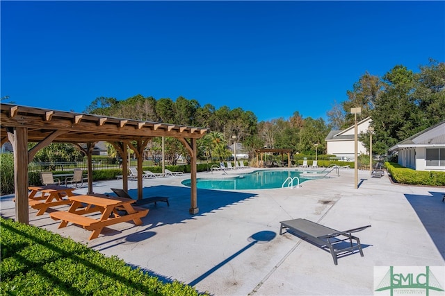 view of pool featuring a pergola and a patio