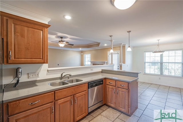 kitchen with ceiling fan, sink, hanging light fixtures, stainless steel dishwasher, and kitchen peninsula