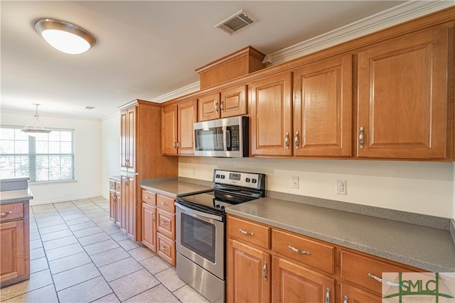 kitchen featuring decorative light fixtures, stainless steel appliances, ornamental molding, and light tile patterned flooring