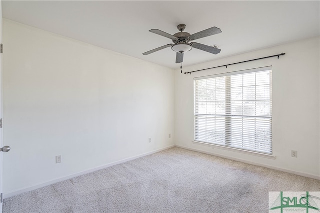 unfurnished room with carpet floors and ceiling fan