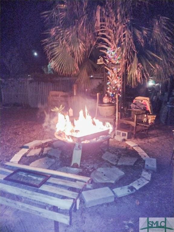 view of pool with a fire pit