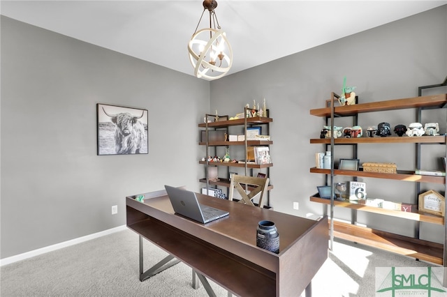 home office with light colored carpet and a notable chandelier