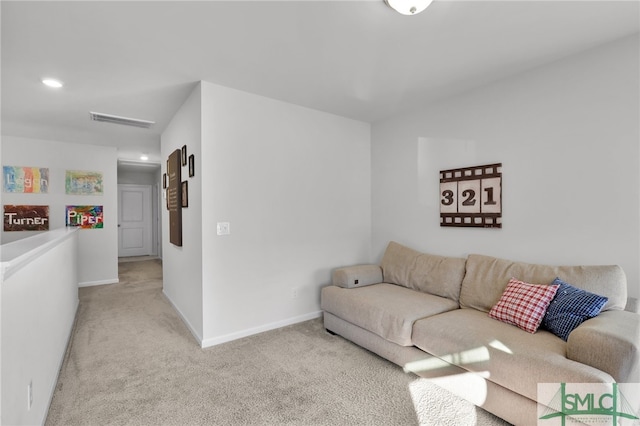 living room with light colored carpet