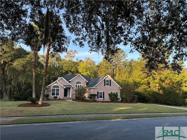 104 Rountree Dr, Richmond Hill, GA 31324 - view of front of property featuring a front yard