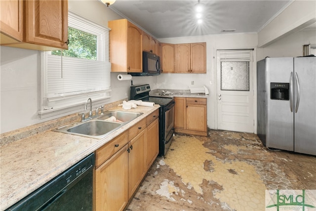 kitchen with black appliances, crown molding, and sink