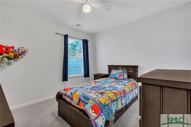 carpeted bedroom featuring ceiling fan