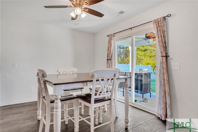 dining space featuring hardwood / wood-style flooring