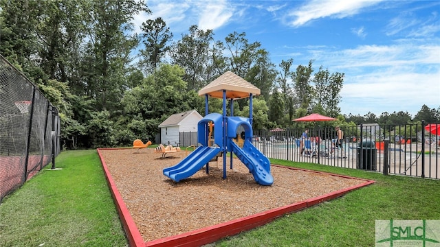 view of jungle gym with a yard