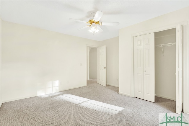 unfurnished bedroom featuring a closet, light colored carpet, and ceiling fan