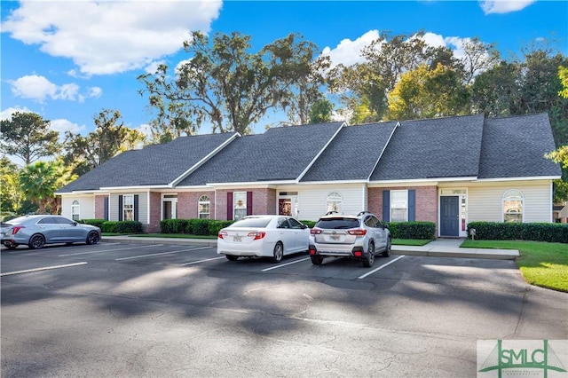 2 Putters Pl, Savannah, GA 31419 - view of front facade featuring uncovered parking and brick siding
