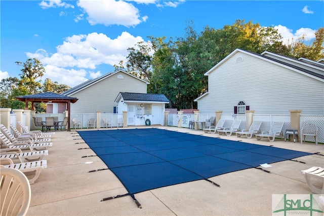 view of pool with a gazebo and a patio area