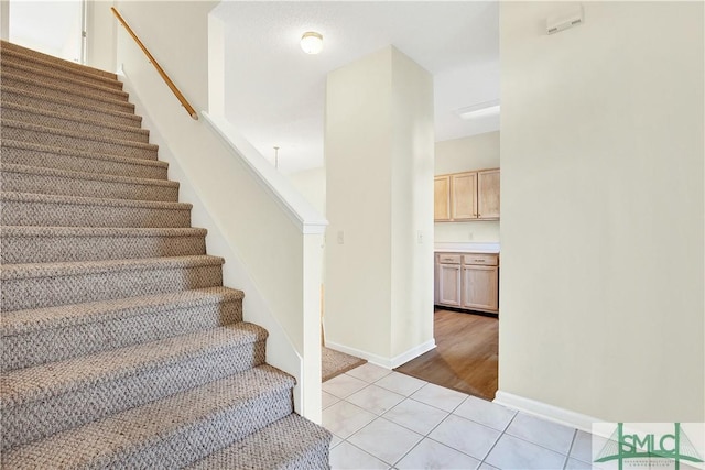 2 Putters Pl, Savannah, GA 31419 - stairway with tile patterned flooring and baseboards