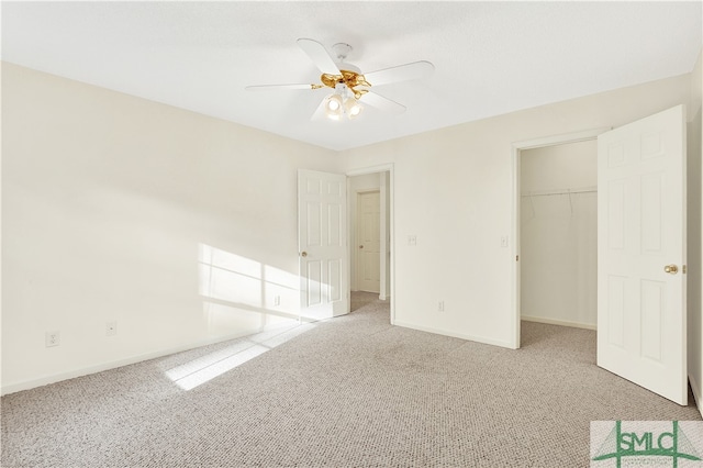 unfurnished bedroom with carpet flooring, ceiling fan, and a closet