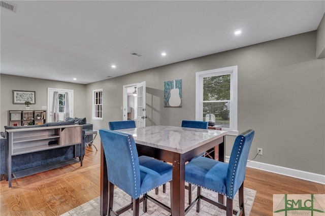 dining room featuring light hardwood / wood-style flooring