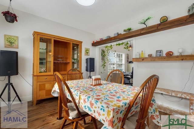 126 Thornbush Ct NE, Ludowici, GA 31316 - dining area with dark hardwood / wood-style floors