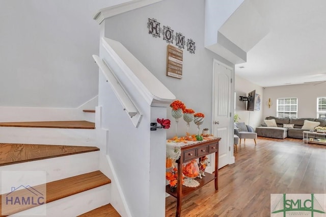 126 Thornbush Ct NE, Ludowici, GA 31316 - staircase featuring hardwood / wood-style floors