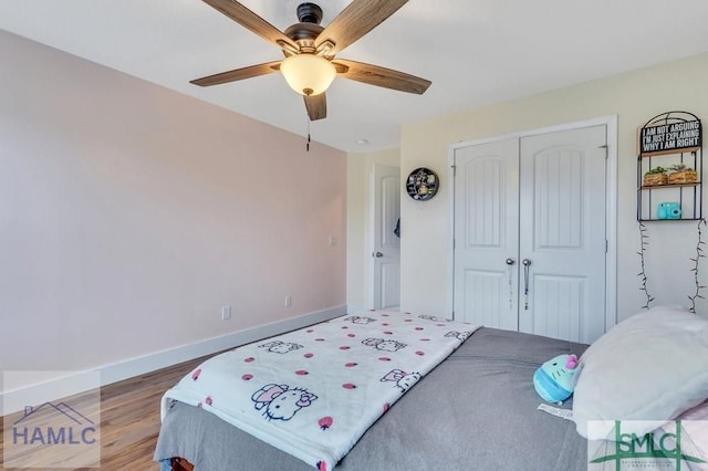 126 Thornbush Ct NE, Ludowici, GA 31316 - bedroom featuring ceiling fan, wood-type flooring, and a closet
