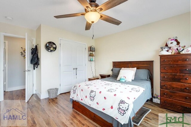 126 Thornbush Ct NE, Ludowici, GA 31316 - bedroom featuring ceiling fan, a closet, and wood-type flooring