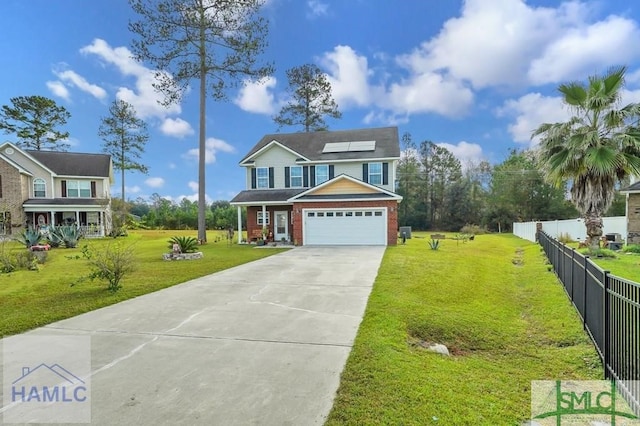 view of front of home featuring a front lawn, solar panels, and a garage