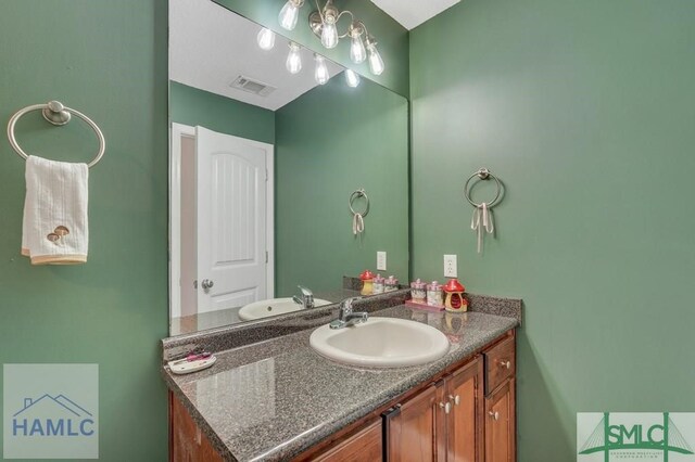 126 Thornbush Ct NE, Ludowici, GA 31316 - bathroom with vanity