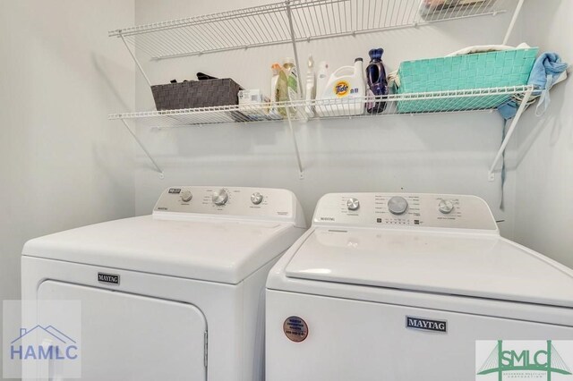 126 Thornbush Ct NE, Ludowici, GA 31316 - clothes washing area featuring washer and clothes dryer