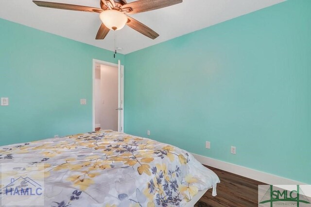 126 Thornbush Ct NE, Ludowici, GA 31316 - bedroom with ceiling fan and dark hardwood / wood-style flooring