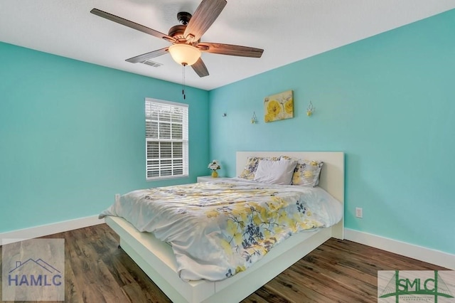 126 Thornbush Ct NE, Ludowici, GA 31316 - bedroom featuring ceiling fan and dark hardwood / wood-style flooring