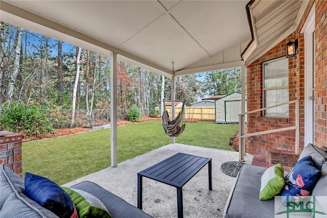 view of patio with a storage unit and an outdoor hangout area