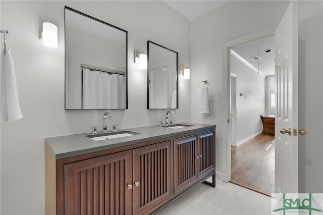 bathroom featuring wood-type flooring and vanity